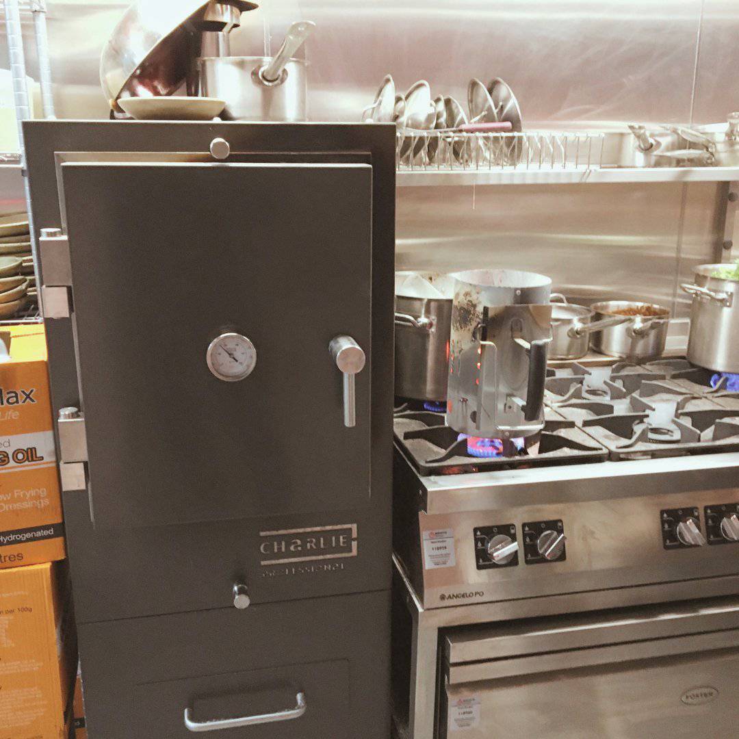 Professional Charlie Charcoal Oven, three-quarter angle