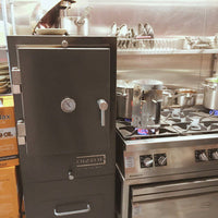 Professional Charlie Charcoal Oven, three-quarter angle